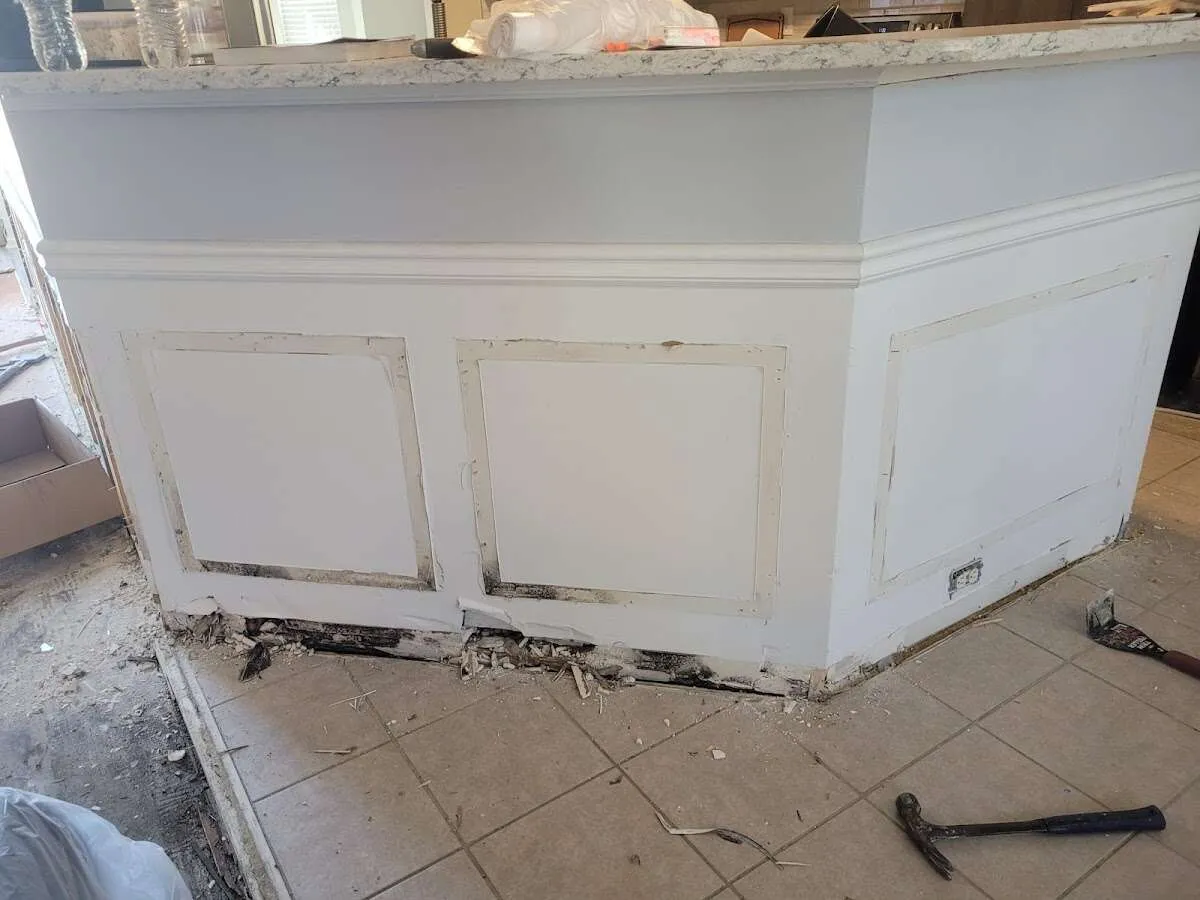 Water damage and mold on kitchen during Storm Damage Restoration in Kendale Lakes